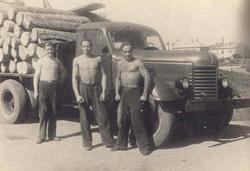 old truck load of firewood logs